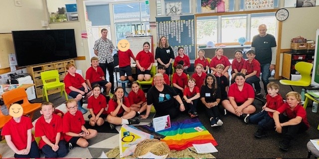 Some of the A Fairer World team with Molesworth Primary School staff and students