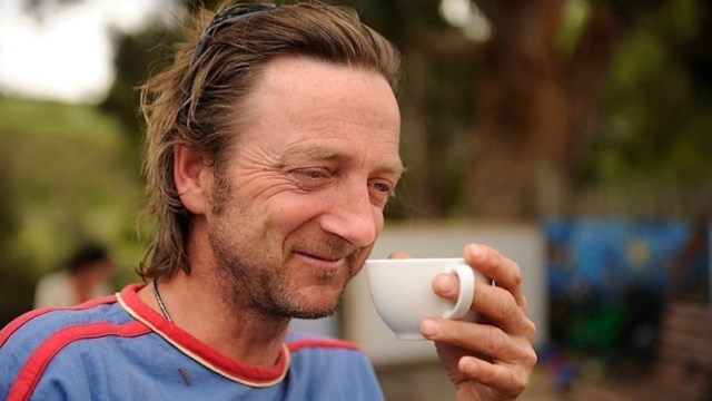 Photo of Paul drinking coffee