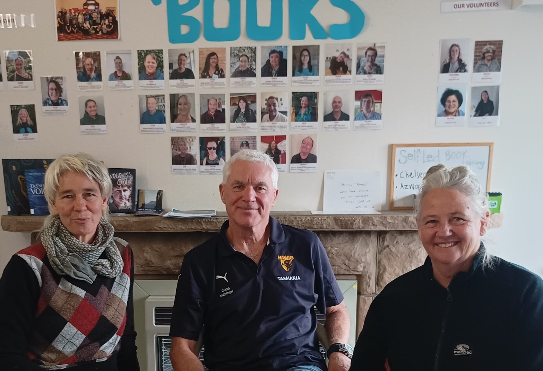 Gabe, Jodie and human 'book' Chris in the A Fairer World office
